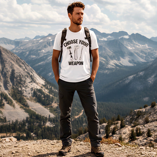 Man standing on a mountain with mountains in the background